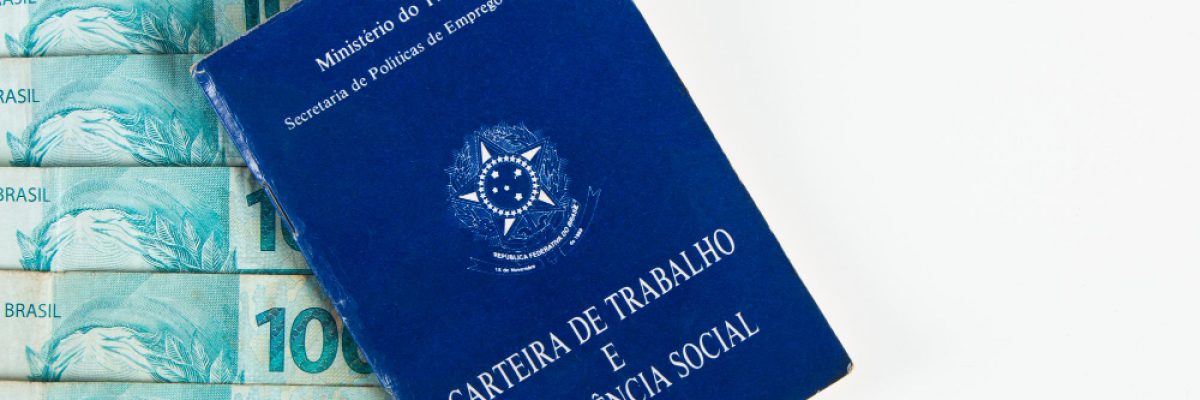 brazilian-document-work-and-social-security-carteira-de-trabalho-e-previdencia-social-with-brazilian-money-banknotes